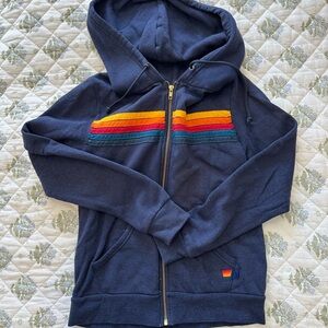 Aviator Nation WOMEN’S Navy Hoodie with Rainbow Chest Stripes